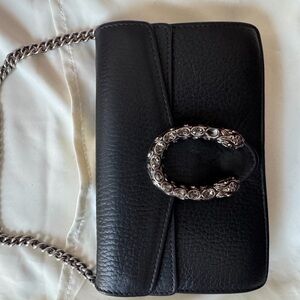 Black Leather Gucci crossbody with Decorative Silver Hardware